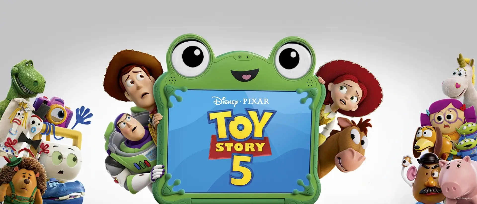 Woody, Buzz, Jessie e outros brinquedos ao redor do tablet verde Lilypad, com o logotipo de Toy Story 5 na tela.